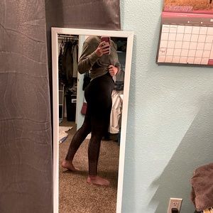 Cute black pair of leggings with pink detailing